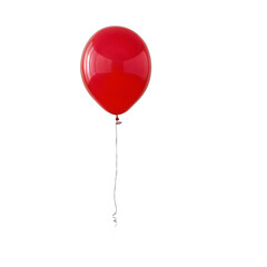  A single red balloon floating in the air