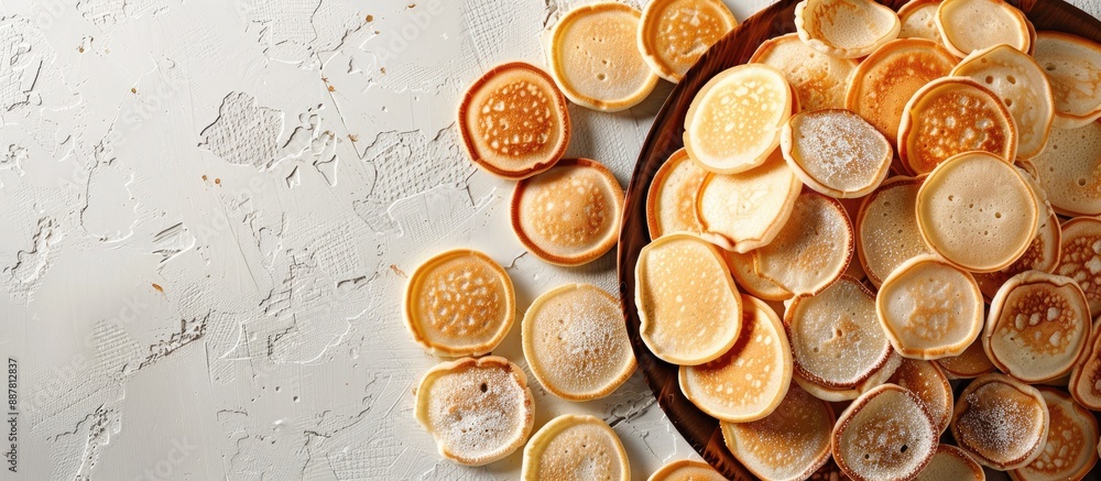 Poster top view background of mini pancakes a menu concept for sweet breakfast or dessert with space for te