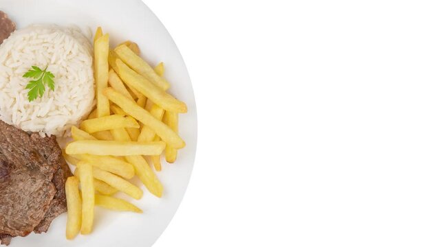Beef, rice, beans and french fries. Typical brazilian executive dish isolated over white background with copy space