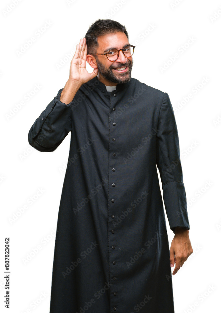 Poster adult hispanic catholic priest man over isolated background smiling with hand over ear listening an 