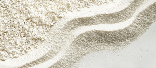 Obraz premium White quartz sand background texture with copy space image