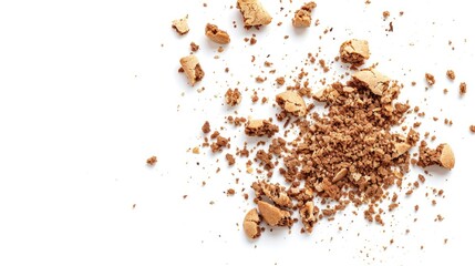 Cake and cookie crumbs scattered on white background with clipping path