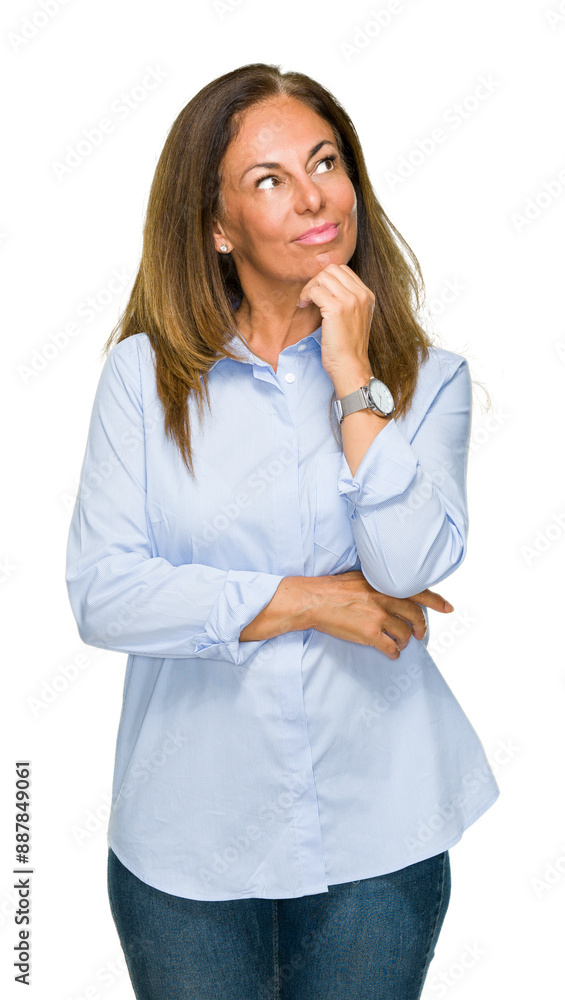 Wall mural beautiful middle age business adult woman over isolated background with hand on chin thinking about 