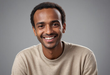 Fototapeta premium Portrait view of a regular happy smiling Eritrea man, ultra realistic, candid, social media, avatar image, plain solid background
