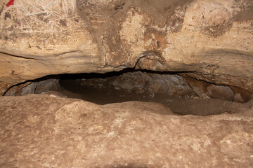The interior view of the natural and historical cave of Karaftu and the place of human habitation...