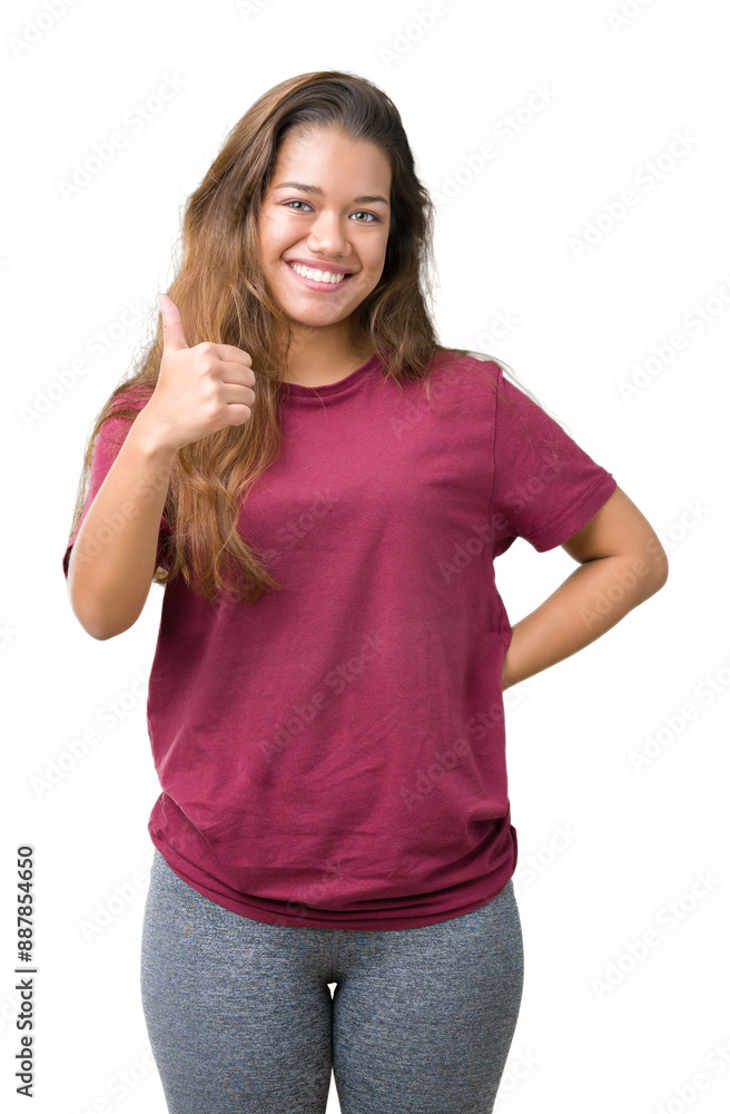 Poster Young beautiful brunette woman over isolated background doing happy thumbs up gesture with hand. Approving expression looking at the camera with showing success.