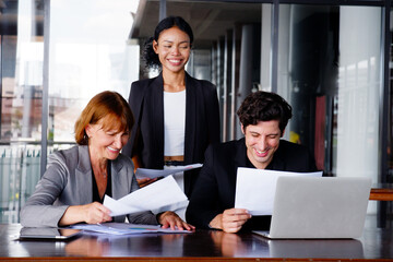 Businessmen and employees sit and work at tables. and business planning meeting.