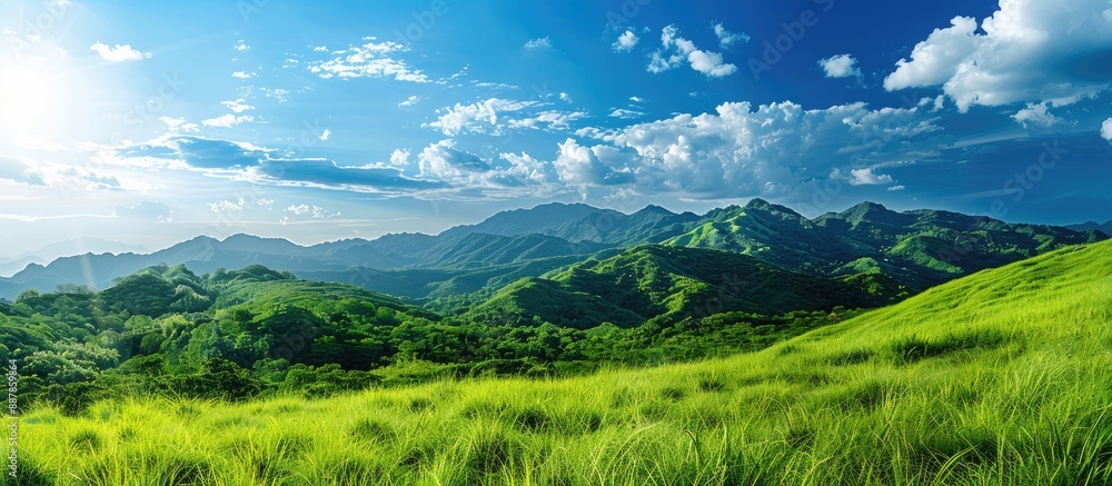 Poster scenic view of lush green mountains against a vivid blue sky providing a serene backdrop for any cop