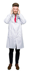 Fototapeta premium Young handsome doctor man wearing medical coat with hand on head for pain in head because stress. Suffering migraine.
