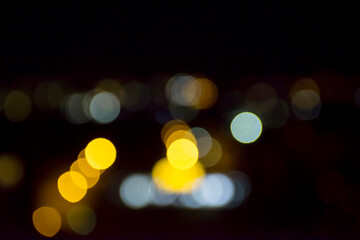 Abstract circular bokeh background of city night light, defocused