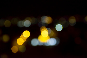 Fototapeta premium Abstract circular bokeh background of city night light, defocused