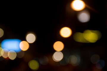 Abstract circular bokeh background of city night light, defocused