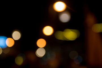 Fototapeta premium Abstract circular bokeh background of city night light, defocused