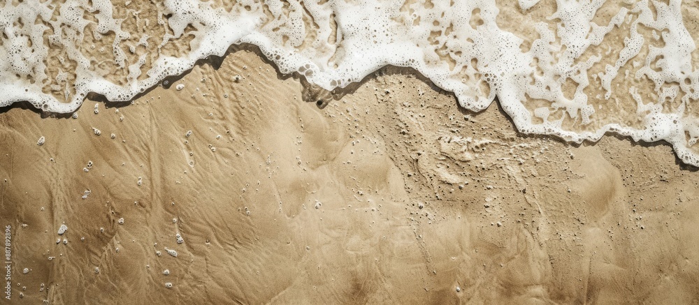 Fototapete Top view of a sandy beach creating a textured backdrop suitable for incorporating a copy space image