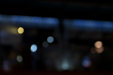 Abstract circular bokeh background of city night light, defocused