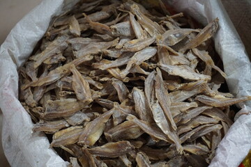 Closeup shot of dried sole fish in a seafood shop, Salted dried fish being sold at an Asian fish market, Freshly caught dried sea fish at a local market