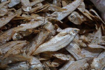 Closeup shot of dried sole fish in a seafood shop, Salted dried fish being sold at an Asian fish market, Freshly caught dried sea fish at a local market