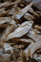 Closeup shot of dried sole fish in a seafood shop, Salted dried fish being sold at an Asian fish market, Freshly caught dried sea fish at a local market