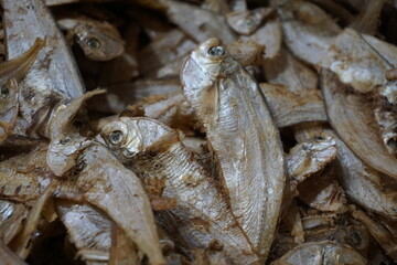 Closeup shot of dried sole fish in a seafood shop, Salted dried fish being sold at an Asian fish market, Freshly caught dried sea fish at a local market