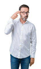 Fototapeta premium Handsome middle age elegant senior business man wearing glasses over isolated background Shooting and killing oneself pointing hand and fingers to head, suicide gesture.
