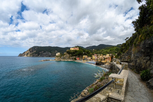 pathway to hillside village in italy on bay