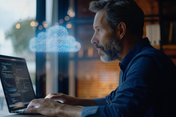 Man coding on laptop with cloud computing hologram