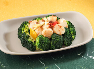 Stir fried Scallops with Broccoli with xo sauce and bell pepper served in dish isolated on background side view of hong kong food