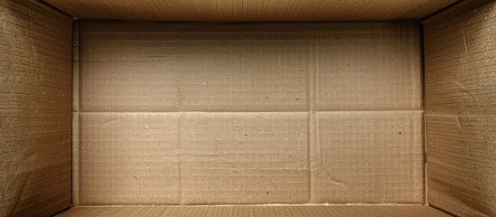Empty inside a flat isolated brown cardboard carton box with unoccupied copy space image