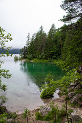 Lake Eibsee and Zugspitze Mountain, Bavarian Alps, Germany, Europe. Immerse yourself in the serene beauty of Lake Hintersee. Surrounded by majestic Alps and dense forests