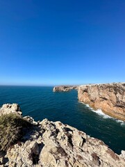 View of strong waves hitting the rock at Sagres, Algarve, Portugal.