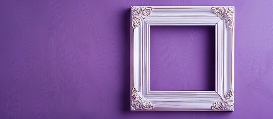 An empty picture frame on a purple backdrop symbolizes the arrival of a new baby in a family with space for adding a photo. Copy space image. Place for adding text and design