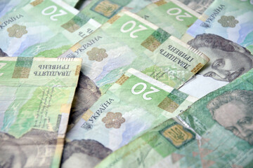 Processed collage of Ukrainian Hryvnia UAH bills banknotes texture. Background for banner