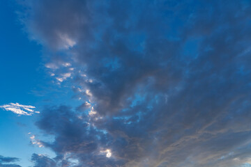 white fluffy clouds standing out against a black background