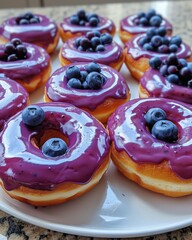 Obraz premium blueberry donuts with blueberry glaze