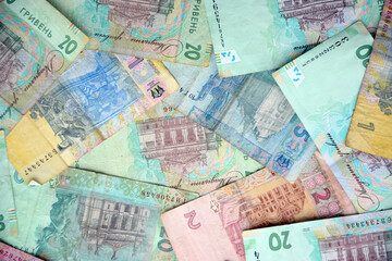 Processed collage of Ukrainian Hryvnia UAH bills banknotes texture. Background for banner