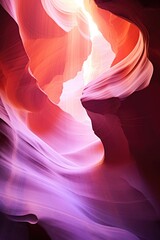 Futuristic abstract natural background. Antelope Canyon. Beautiful and colorful narrow slot canyon wall in blue and pink colors. Sand scoured rocks texture. Travel and vacation concept