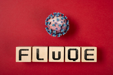 coronavirus and FLuQE variant on a red background