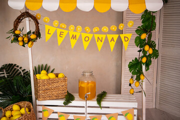 a basket of lemons and lemons with a banner that says lemonade