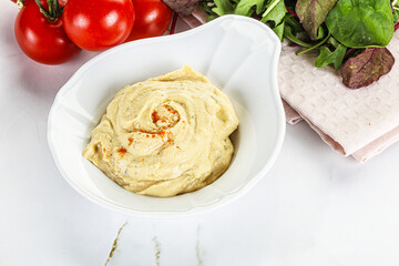 Creamy hummus in the bowl
