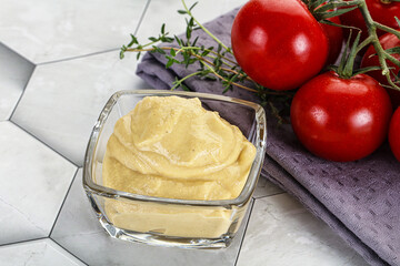 Dijon mustard sauce in the bowl