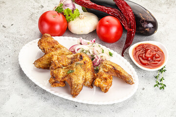 Grilled chicken wings with sauce