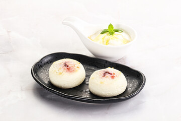 Curd pancakes with sour cream
