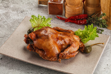 Baked small chicken with spices