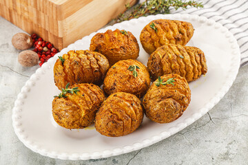 Baked baby potato with thyme