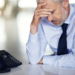 Mature businessman, headache and stress with telephone in debt, bankruptcy or mistake at office...