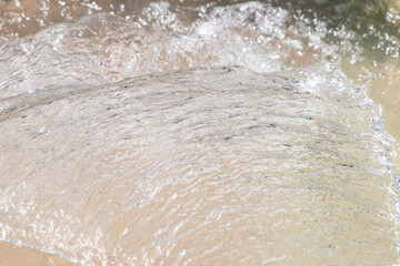 Water fountain in park, close-up of water splashing as water background