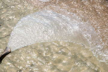 Water fountain in park, close-up of water splashing as water background