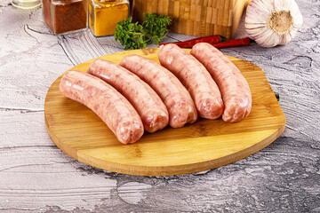 Raw meat sausages for grill