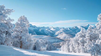 A snowy mountain landscape under a clear winter sky