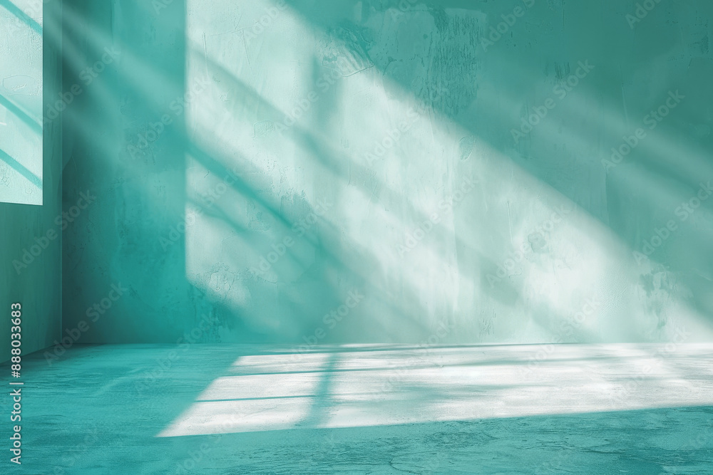 Poster sunlit empty room with turquoise walls and floor creating a calm and serene atmosphere